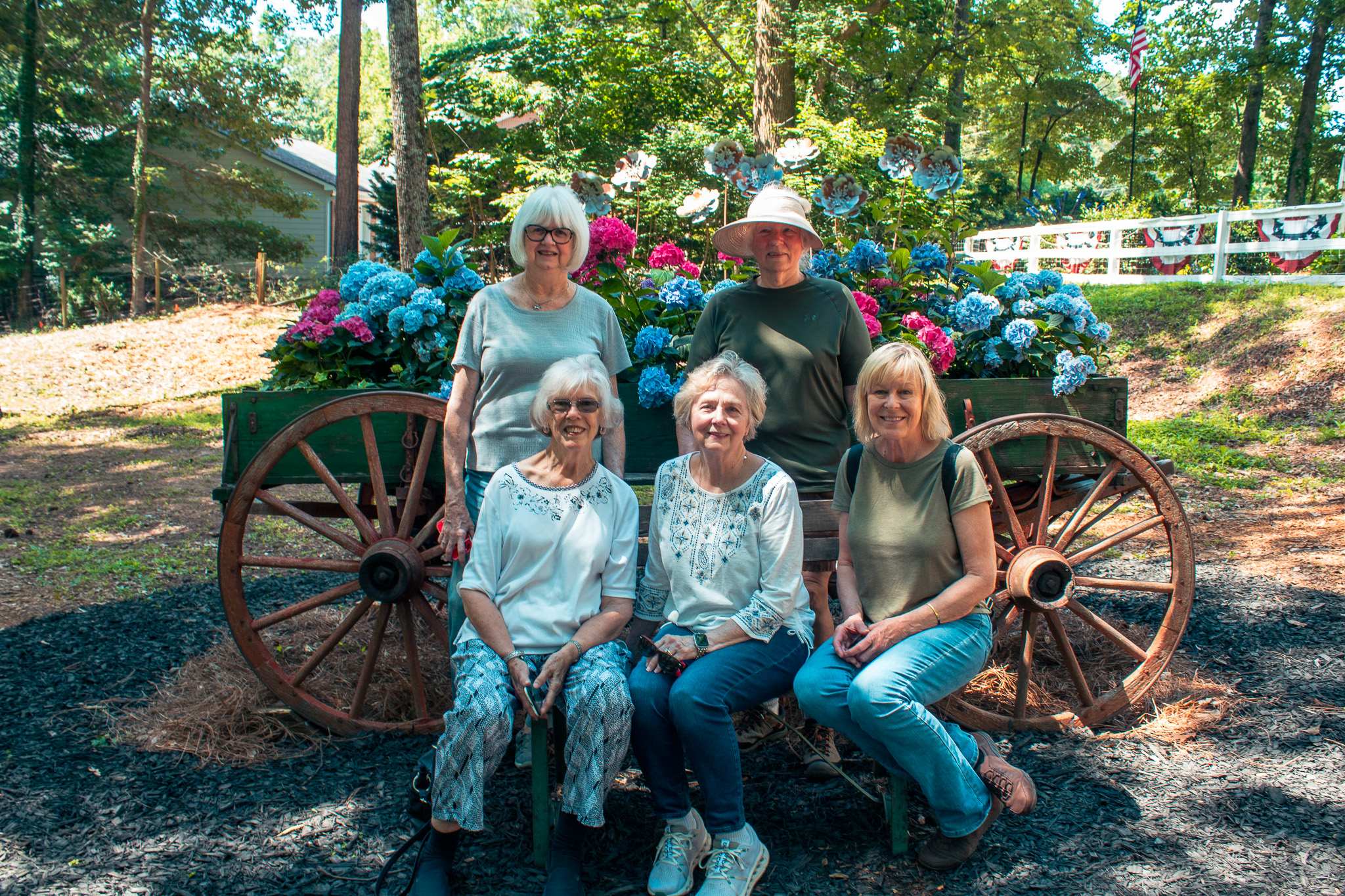 Group portrait in front of the hydrangea wagon