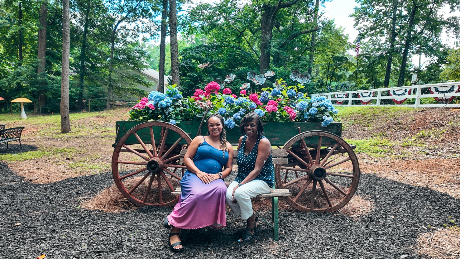 Friends posing with hydrangeas