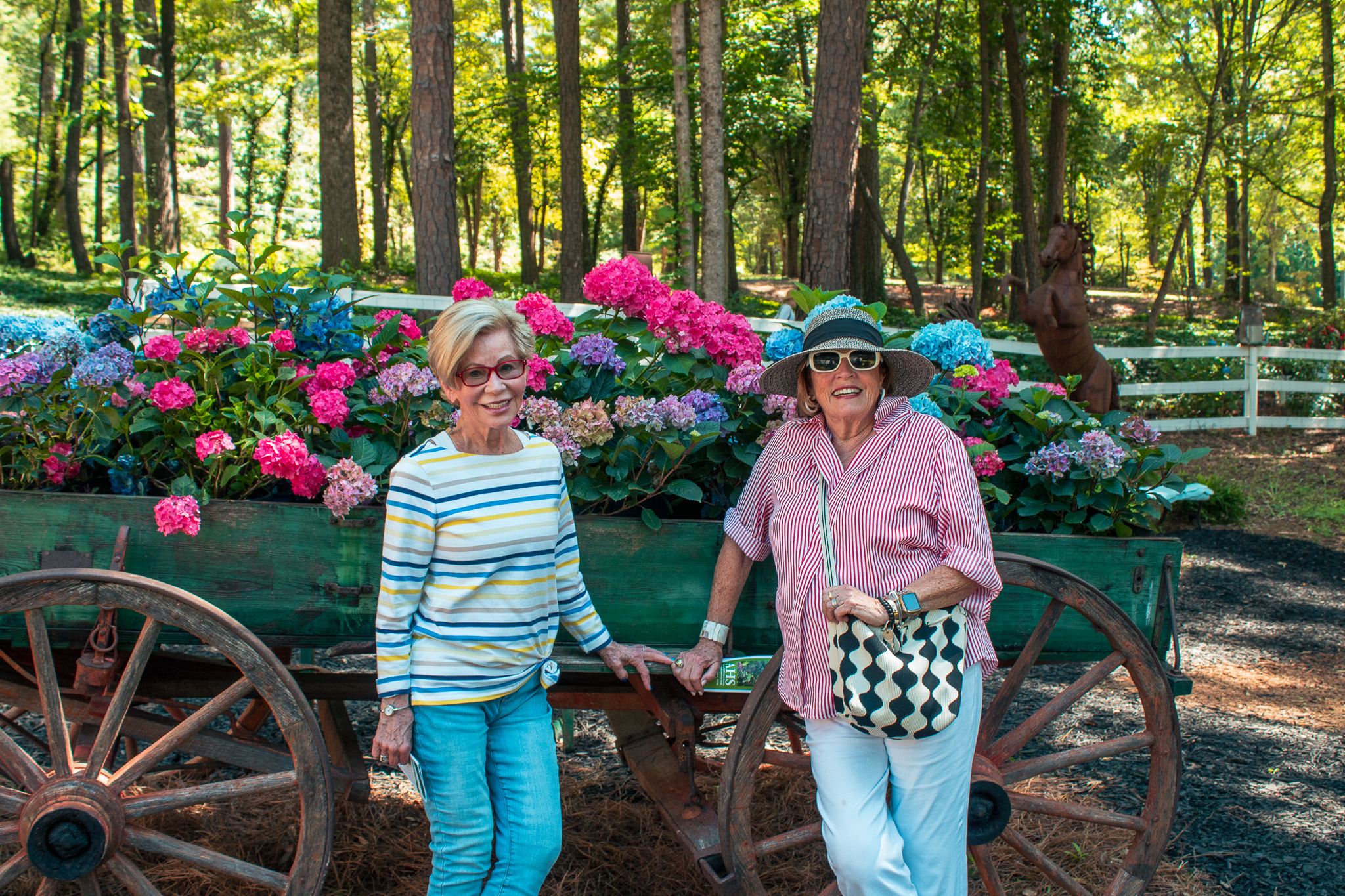 Guests posing by the hydrangea wagon