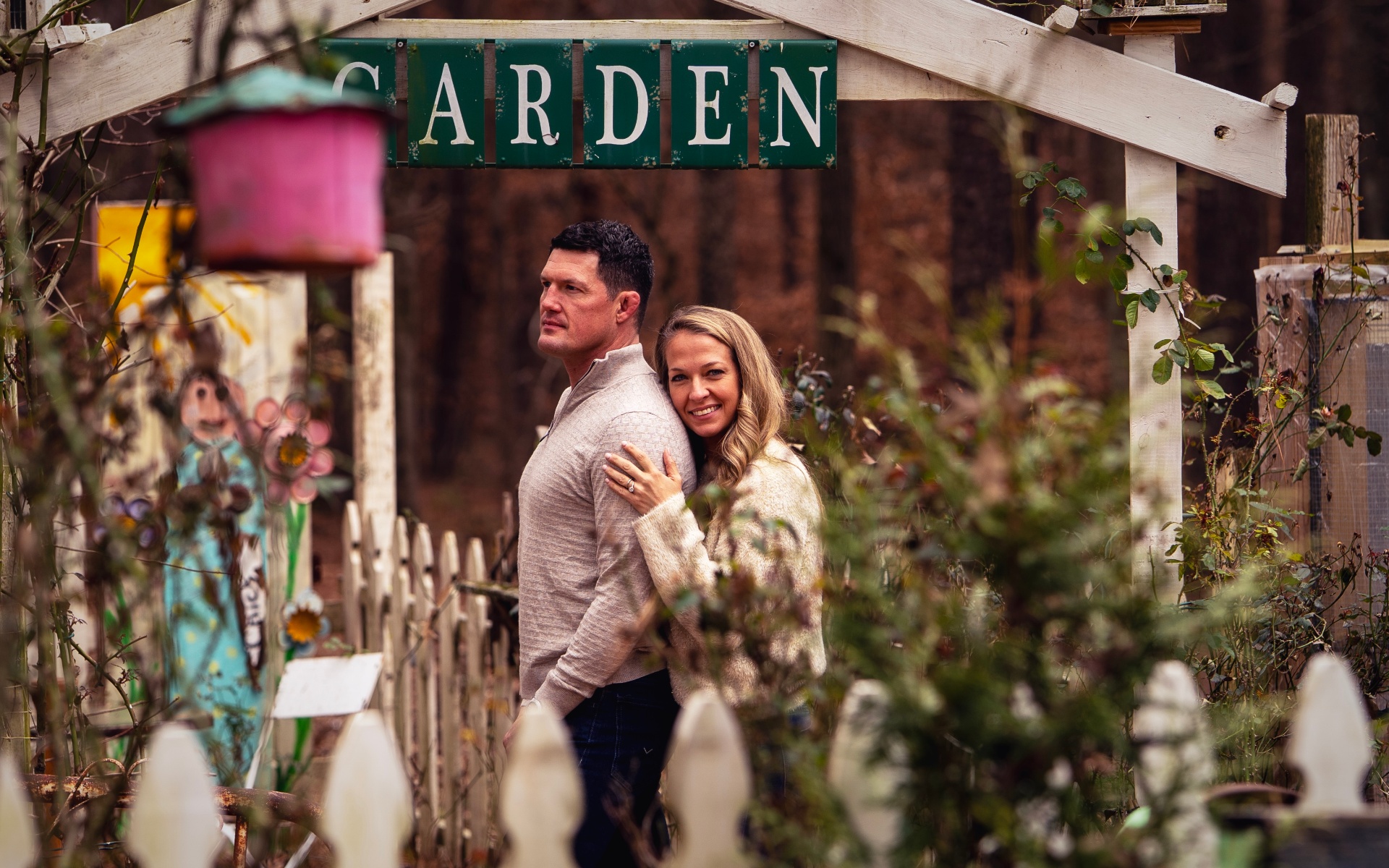Couple at the garden sign