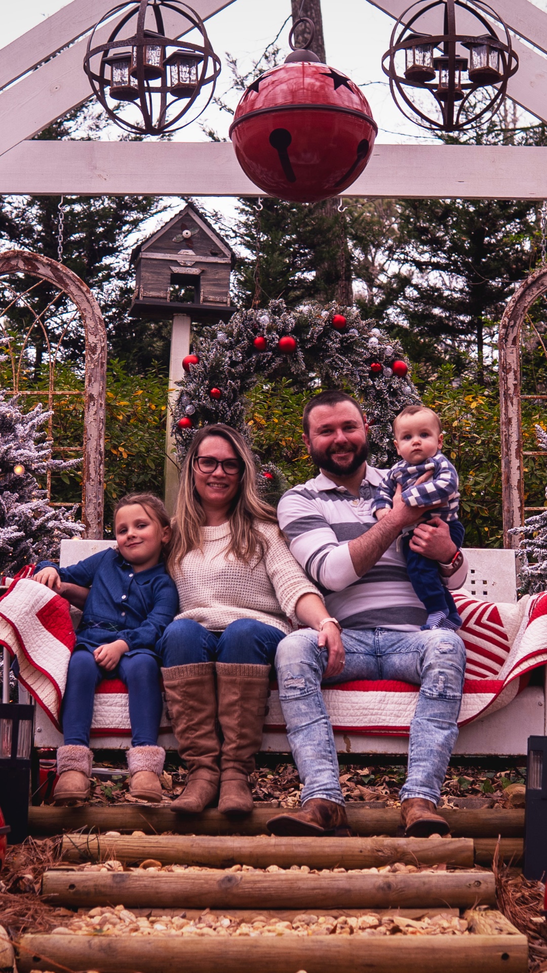 Family at the pergola with Christmas decorations