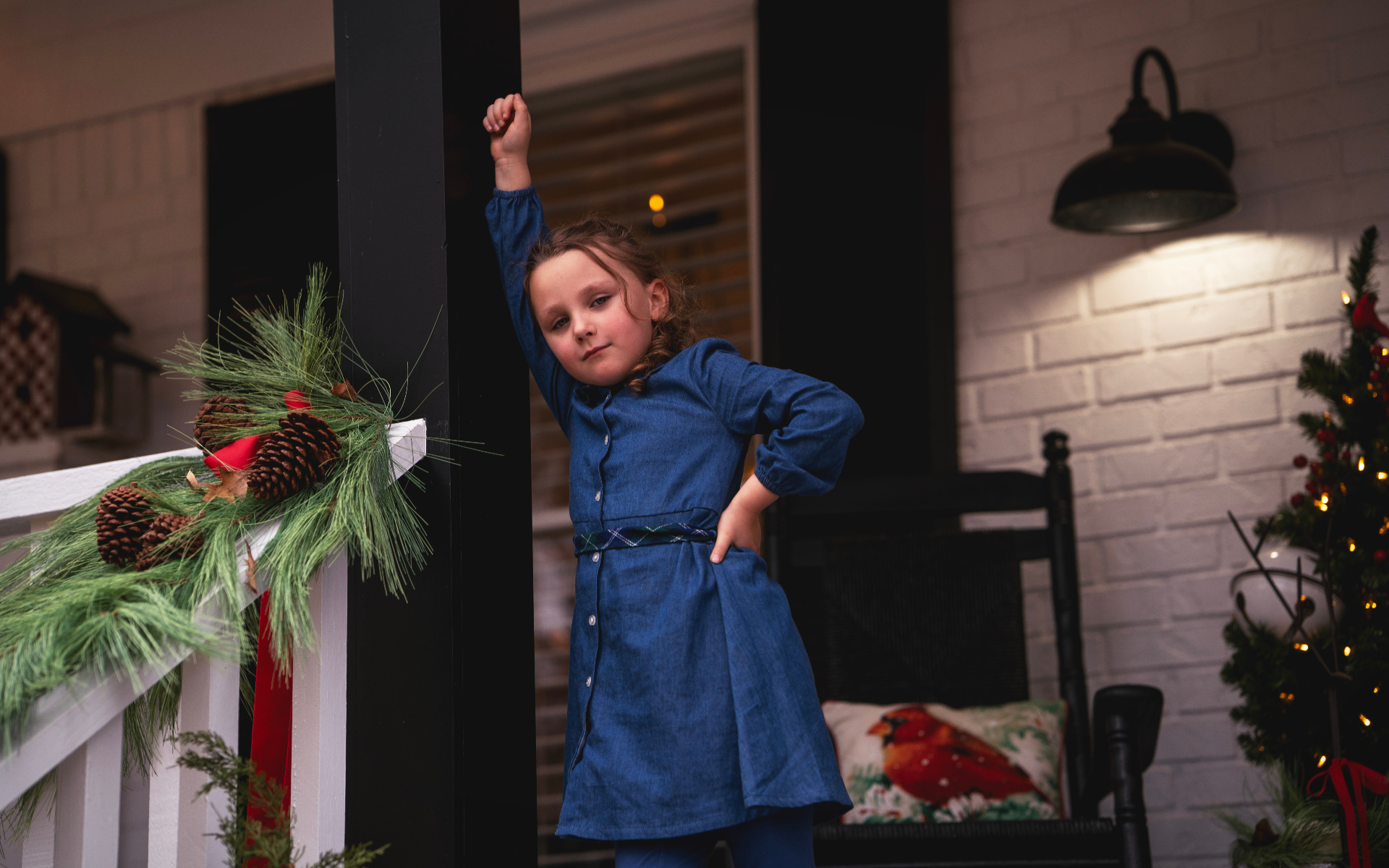Little girl posing on the porch